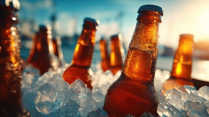 The refreshing beer bottles chilling in ice on a sunny day