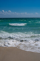 Sea waves background. Summer ocean water motion. Ocean splash wave background. Deep blue sea beach. Turquoise wave. Dreamy exotic sea beach. Beautiful sea beach waves.