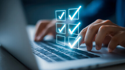 Person typing on laptop keyboard with glowing digital checklist icons hovering above, symbolizing task completion and productivity in a modern workspace environment