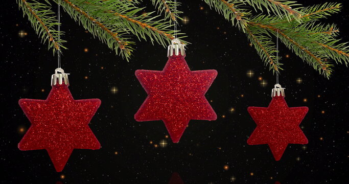 Naklejki Image of yellow stars over christmas decorations