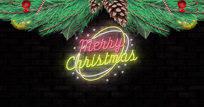 Image of fir trees over neon merry christmas text