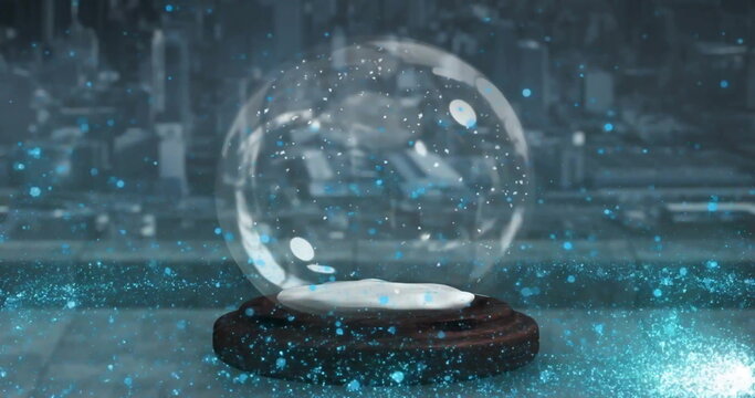 Image of shooting star over christmas snow globe and cityscape - Powered by Adobe