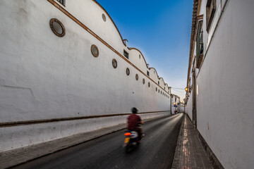 Naklejka premium Quiet evening on Luis de Eguilaz Street in Sanlucar de Barrameda