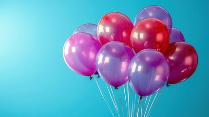 Purple and red balloons floating in the sky, close - up highlights colors, great for festive events
