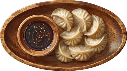 Close-up of steamed momos served on a wooden plate with spicy red chutney in a bowl