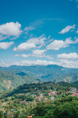 Scenic Mountain Village under Blue Sky in Mines View Park, Baguio City, Philippines