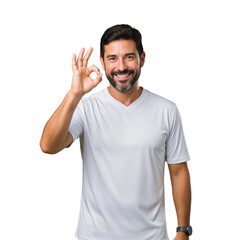 Fototapeta premium Happy middle-aged man in a white t-shirt making an OK gesture, showing approval and confidence with a cheerful smile on a black background.