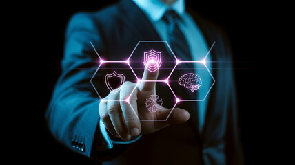 Man in suit touching digital interface with shield and brain icons finger