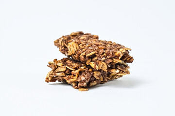 Granola Bars isolated on white background. Two. pile, stack. High protein snack. Broken, half. Close up view. clipping path.