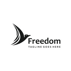 Obraz premium Minimalist Black Bird Freedom flying for liberty emancipation animal wildlife Logo Design