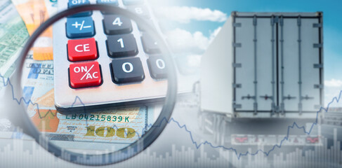 Logistics business. Rear view of delivery truck. Calculators and money on logistician desk. Logistics industry. Logistics company revenue fluctuations chat. Truck business quotes. Shipment of goods