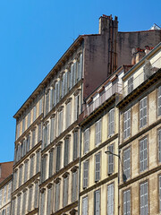 Facades of Traditional French Buildings in Marseille on a Sunny July Day 
