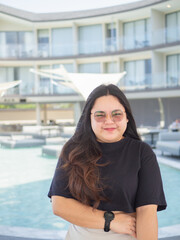 Body positive curvy Asian woman smiling and enjoying casual day.