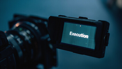 Close-up view of a digital camera screen displaying a logo with the text 'eurogym' illuminated hinting at fitness and event technology.