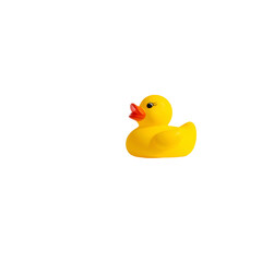 A yellow toy duck floats in darkness.