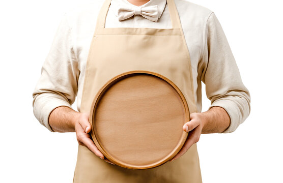 Waiter in Apron Presenting Blank Wooden Serving Board isolated on a transparent background