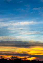 Silhouette of traffic sign on the roadway during a sunset in Brazil