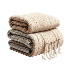 Stacked knitted blankets in neutral tones with fringed edges.