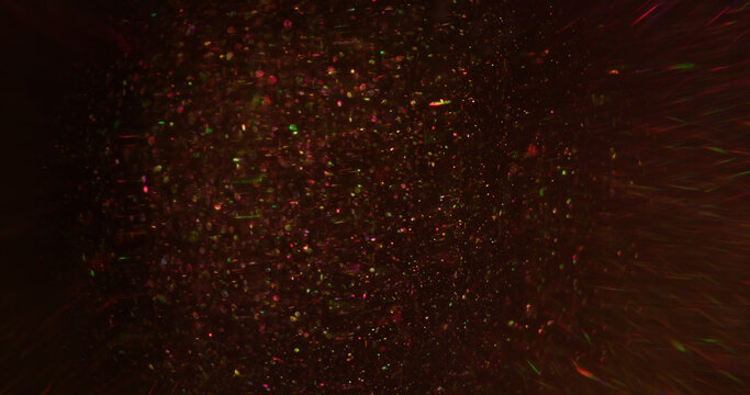 Bokeh light. Vibrant particles. Blur pink purple color illuminated gleam shimmer round glint art floating on abstract black background.