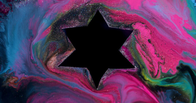 Ink star spill. Geometric abstraction. Defocused pink blue yellow colorful texture glitter bubble fluid dark black liquid on bokeh art background.