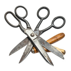 Crossed antique sewing scissors and wooden tool rest on black.