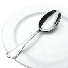 Polished spoon rests on a clean white plate, ready for dining.
