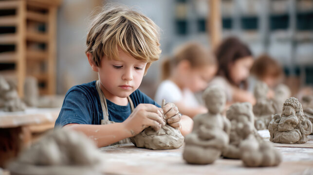 A young Caucasian boy is engrossed in sculpting clay figures during a school art class. Surrounded by classmates, he demonstrates concentration and artistic skill while shaping his creation - Powered by Adobe