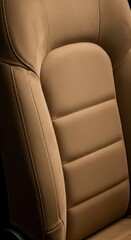 Obraz premium Detailed view of a comfortable, stitched leather automotive seat.