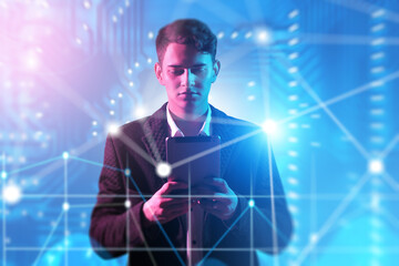 Information Technology, Artificial Intelligence, Data Analysis. A young man uses a tablet with glowing digital network and futuristic interface in the background.