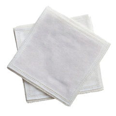 Two white linen napkins stacked on each other isolated on transparent background