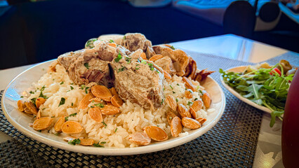 Traditional Jordanian Mansaf with Lamb, Rice, and Jameed Yogurt Sauce 