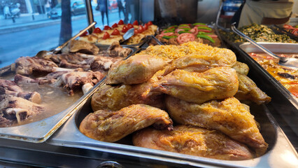Delicious grilled chicken and sides at street food market