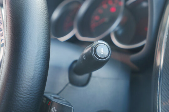 Car gear shift in a modern vehicle interior close-up