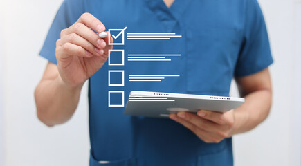 close up young general practitioner hand use stylus pen to check box on medical chekclist or opd...