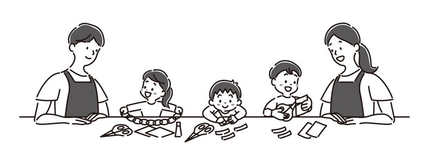 笑顔で工作をする女の子と男の子の園児と保育士の白黒のイラスト素材