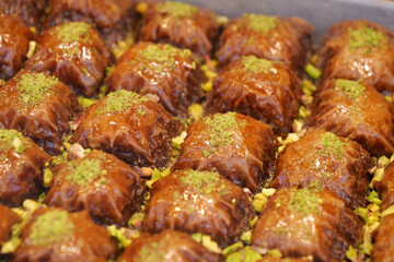 Delicious baklava displayed at a market in the afternoon