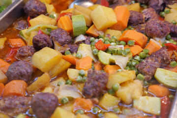 Delicious meat and vegetable stew on a serving tray