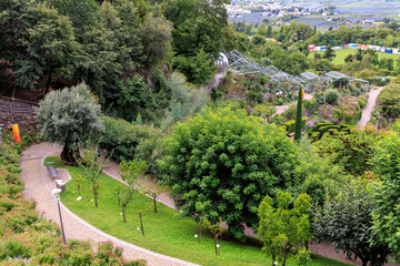 Gardens of Trauttmansdorff Castle panorama with flowers, trees and plants near Merano, South Tyrol, Italy