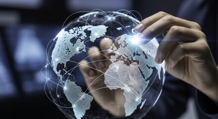 Human hand interacting with a glowing digital globe, illustrating global communication, technology, and interconnected business networks.