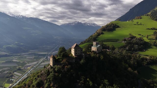 Juval Castle Medieval castle located at the entrance of the Schnalstal, Italy. Overlooking valley. Aerial drone video.