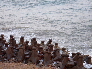 Coastal defenses tetrapods, breakwater concrete structures, wave breakers, shoreline protection
