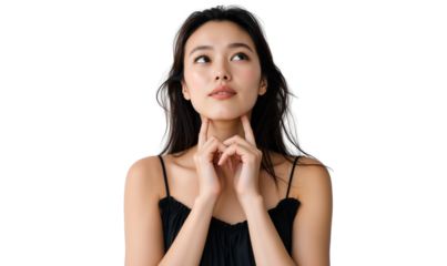 Beautiful Asian woman looking up, touching chin with fingers, isolated on transparent background