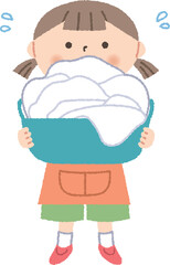 大量の洗濯物を持っている女の子