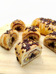 Baked Indonesian Delicacy Bolen Pisang Ready To Eat Offered Against a White Background