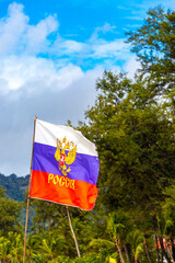 Russian flag in the tropical nature in Patong Phuket Thailand.