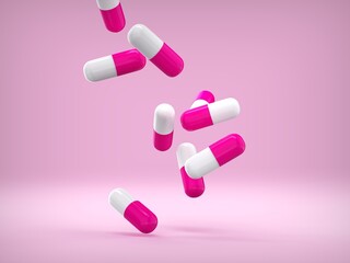 Falling pink white medicine pills capsules on blue background. 