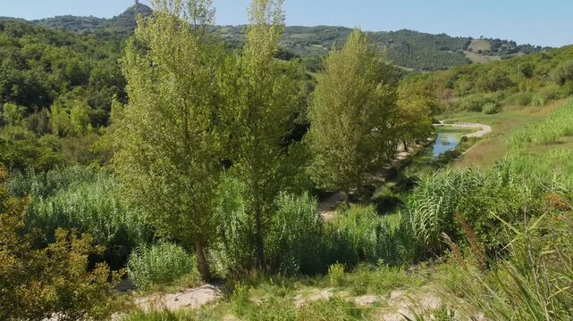  Parco naturale dei Mulini, public park with hot springs and dismantled system of grain mills at Bagno Vignoni, town in the province of Siena, Italy	