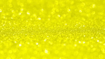 Abstract gold glitter sparkle texture with bokeh background