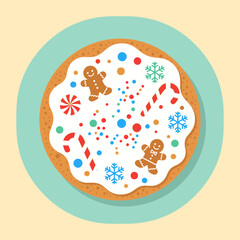 A festive gingerbread cookie, adorned with white icing and colorful holiday decorations, rests on a blue plate, perfect for Christmas.