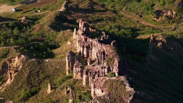 high angle orbit shot of the unique rock formations and sandstone towers in los estoraques national park